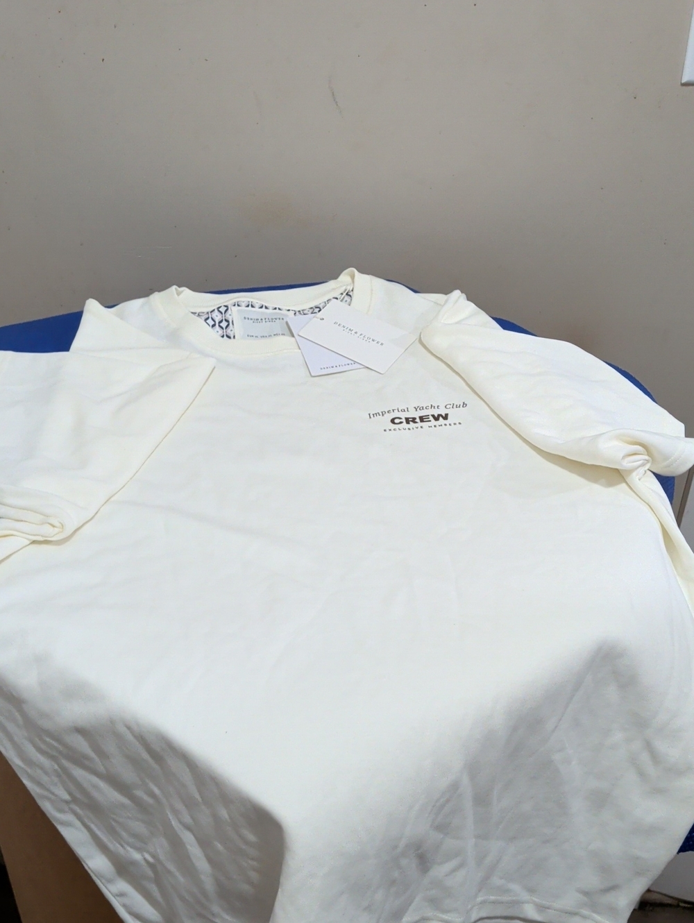 Denim & Flower Cream Crewneck with Subtle Chest Logo